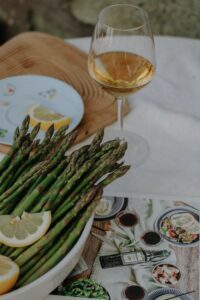 Asparagus with lemon and a glass of wine