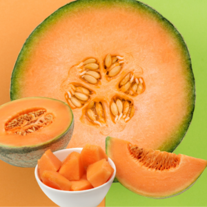 A fresh cantaloupe sliced open, revealing its juicy orange flesh and seeds, with a bowl of cantaloupe chunks and a cantaloupe wedge beside it.