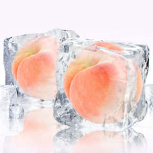 Article : Growing Peach Trees in Pots. Pic - Two ripe peaches encased in large ice cubes, with smaller ice cubes surrounding them on a reflective surface.